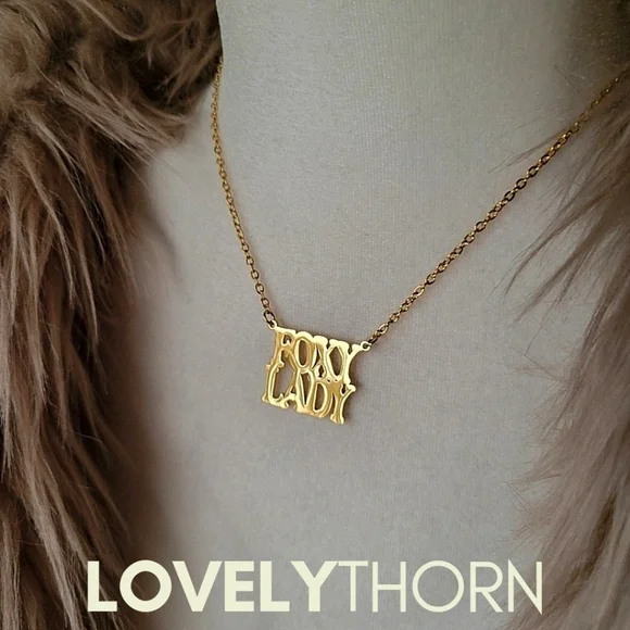 LOVELYTHORN // custom foxy lady 18K gold-plated 16 stainless steel nameplate
